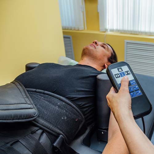 How Spinal Decompression and Laser Therapy Can Help You Recover from Your Back Injury
